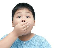 Surprised little fat boy child isolated on white background photo