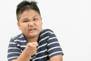portrait of a angry obese boy isolated photo