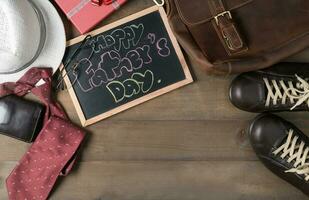 Happy Father's day on blackbroad with accessories photo