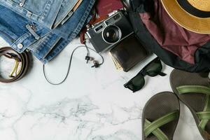 Backpack accessories and travel items for summer photo