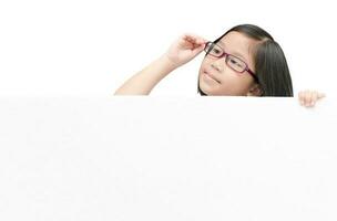 cute asian girl thinking with white board banner photo