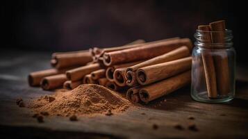 Cinnamon sticks and powder, isolated on black background, photo