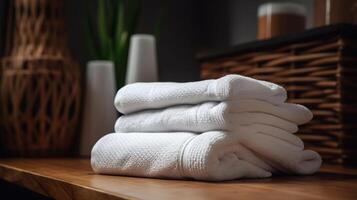 blanco limpiar toallas en de madera mesa en baño, generativo ai foto