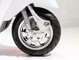 Gray color front wheel motorcycle scooter photo