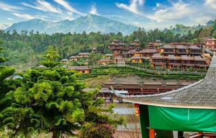 Exciting view of Ban Rak Thai yunnan village with vlue skies and cloud photo