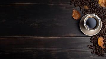 Coffee cup and beans on old kitchen table. Top view with copyspace for your text, photo