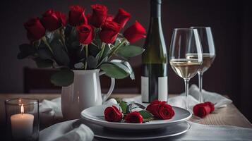 Valentines day dinner with table place setting with red gift, glass for champagne, a bottle of champagne, pink roses, photo