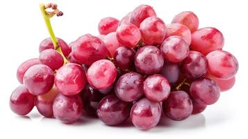 Ripe red grape. Pink bunch with leaves isolated on white. With clipping path, photo
