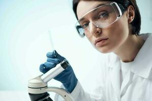 woman laboratory assistant microscope diagnostics research professionals science photo