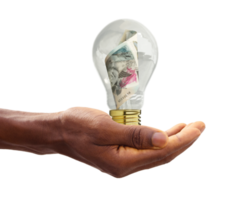 A hand holding a 3d rendering of East Caribbean Dollar note inside transparent light bulb isolated on transparent background, creative thinking. Making money by solving problem. idea concept png