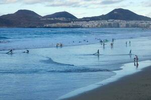 Surf school on an ocean beach photo