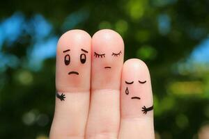 Finger art of displeased family. Concept of solution to the problems of family, support in difficult situations. photo