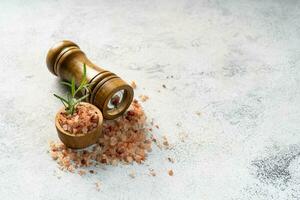 Himalayan pink salt is herb seasoning from himalaya and isolated on white abstract background with copy space photo