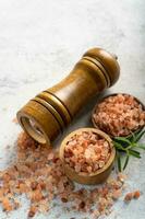 Himalayan pink salt is herb seasoning from himalaya and isolated on white abstract background with copy space photo