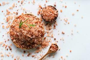 Himalayan pink salt is herb seasoning from himalaya and isolated on white background with copy space photo