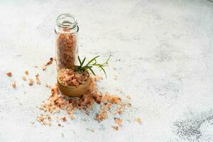 Himalayan pink salt is herb seasoning from himalaya and isolated on white abstract background with copy space photo