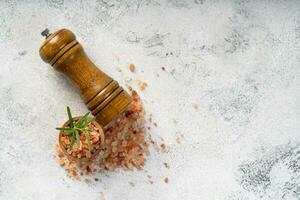 Himalayan pink salt is herb seasoning from himalaya and isolated on white abstract background with copy space photo