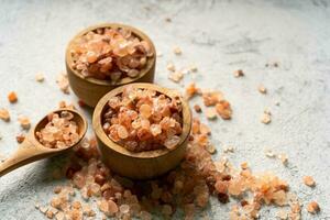 Himalayan pink salt is herb seasoning from himalaya and isolated on white abstract background with copy space photo