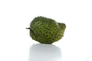 Raw Soursop on white background. photo