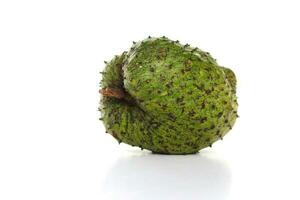 Raw Soursop on white background. photo