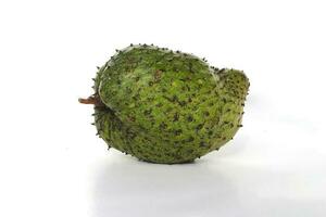 Raw Soursop on white background. photo