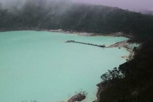 Landscape view of Kawah Putih from the Sunan Ibu Hills photo