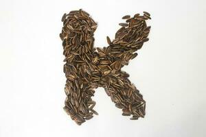 Alphabet made from Sunflower Seeds photo