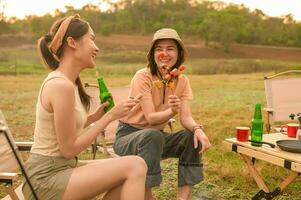 young pretty Asian woman  enjoy camping photo