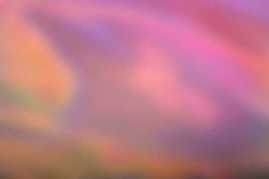 Abstract holographic iridescent foil background photo