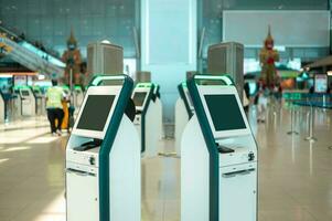 Online check in machine at Airport photo
