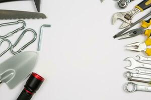 Set of tools for repair in a case on a white background. Assorted work or construction tools. Wrenches, Pliers, screwdriver. Top view photo