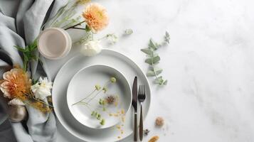 Cute Table setting with floral decor on light background with space for text, top view, photo