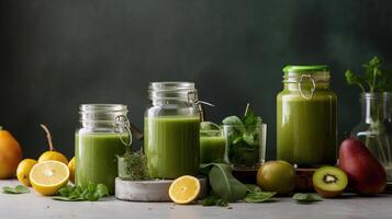 Glass jar mugs with green health smoothie, kale leaves, lime, apple, kiwi, grapes, banana, avocado, lettuce. Copy space. Raw, vegan, vegetarian, alkaline food concept, photo