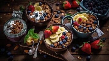 Homemade granola with nuts and raisins, kiwi, blueberries, banana, strawberries and plain yogurt, photo