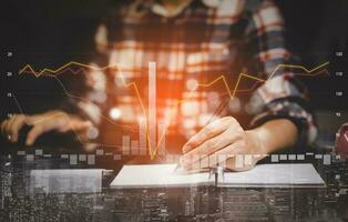 writing check planning checklist report concept, Businessman holding pen working with document, Business analytics and financial concept, Plans to increase business growth and increase ,Technology photo