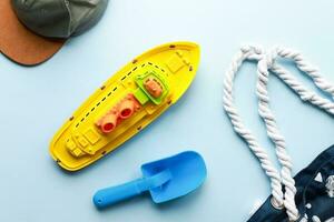 Flat lay beach vacation. Children is beach things. Beach toys. Sandbox toys photo