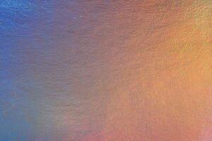 An iridescent holographic foil background pastel colors photo