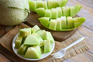 cantaloupe thai slice fruit for health green cantaloupe thailand, cantaloupe melon on plate wooden photo