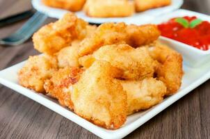 Chicken nuggets served photo