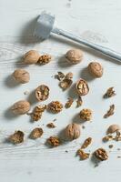 Splashed walnuts on the table photo