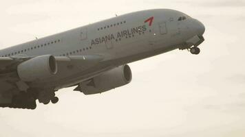 FRANKFURT AM MAIN, GERMANY JULY 17, 2017 - Passenger Airbus A380 of Asiana Airlines takes off and climb at Frankfurt Airport FRA. Close up, a huge double deck airbus takes off video