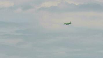 NOVOSIBIRSK, RUSSIAN FEDERATION JUNE 27, 2021 - Jet airplane Airbus A320 of S7 airlines landing at Tolmachevo airport OVB. Airplane in the sky. Flying on a journey video