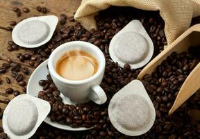 Coffee cups with pods photo
