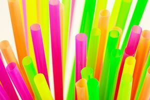 Plastic drinking straws photo