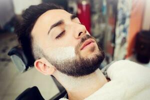 Traditional ritual of shaving the beard photo