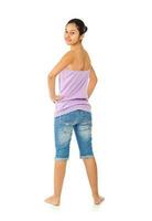 Teen girl with blue jeans and tank top photo