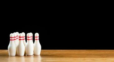 Bowling pins and bowling ball in miniature photo