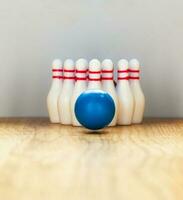 Bowling pins and bowling ball in miniature photo