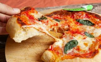 Fresh Homemade Italian Pizza Margherita with basil photo