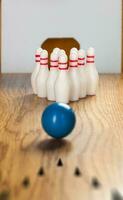 Bowling pins and bowling ball in miniature photo